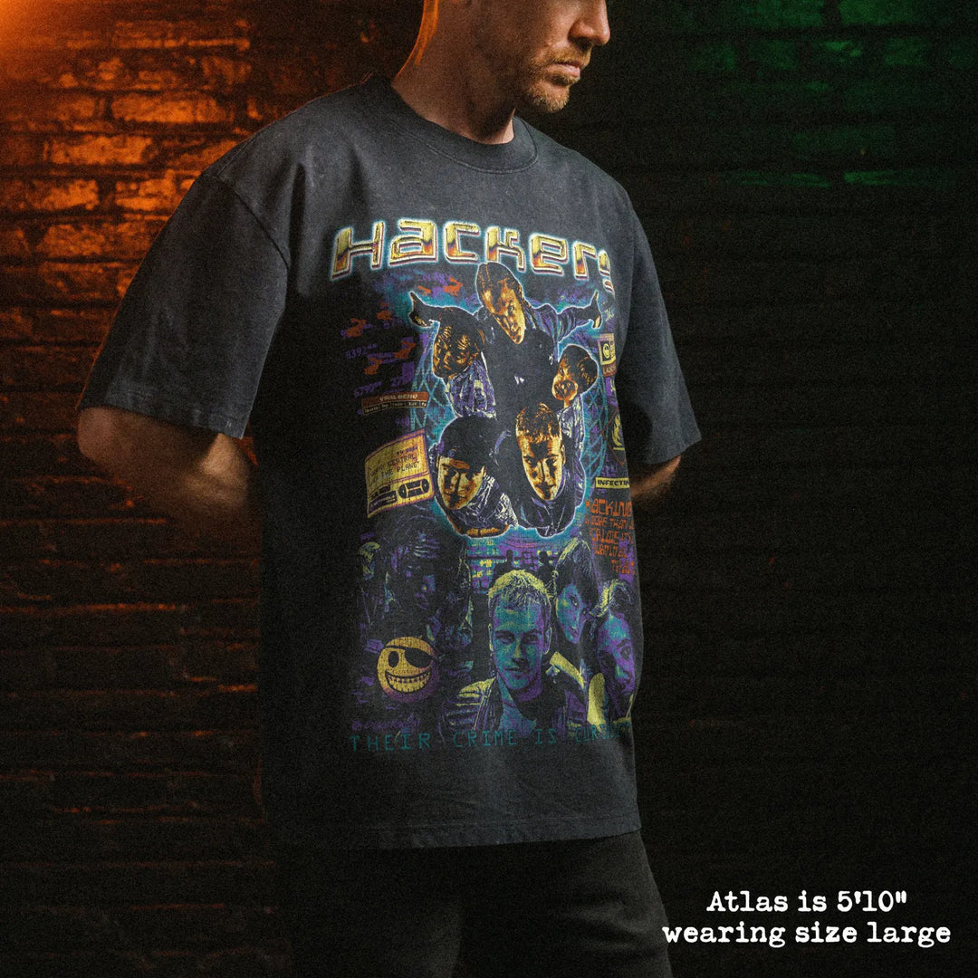 Male model wearing stone wash heavy tee with hackers graphic 