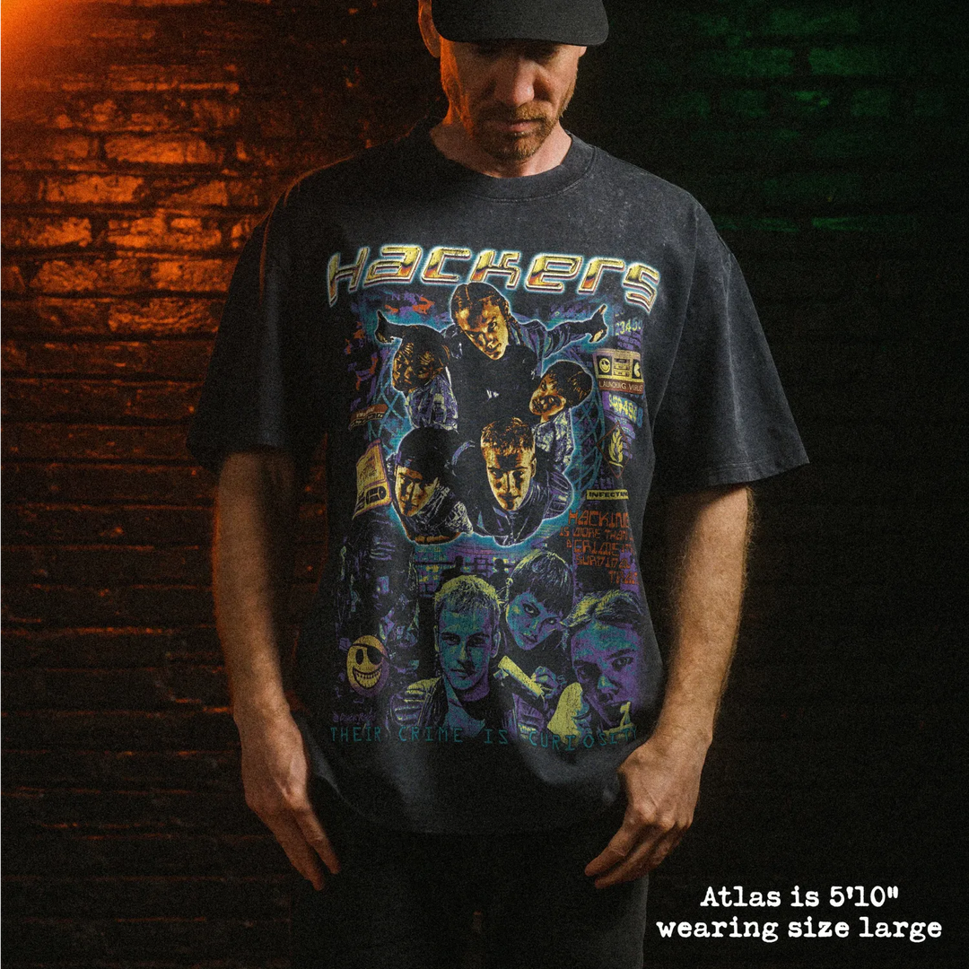 Male model wearing stone wash heavy tee with hackers graphic 