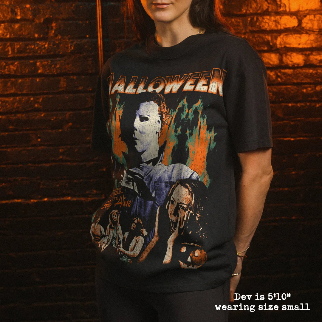 Model wearing heavy tee with halloween graphic 