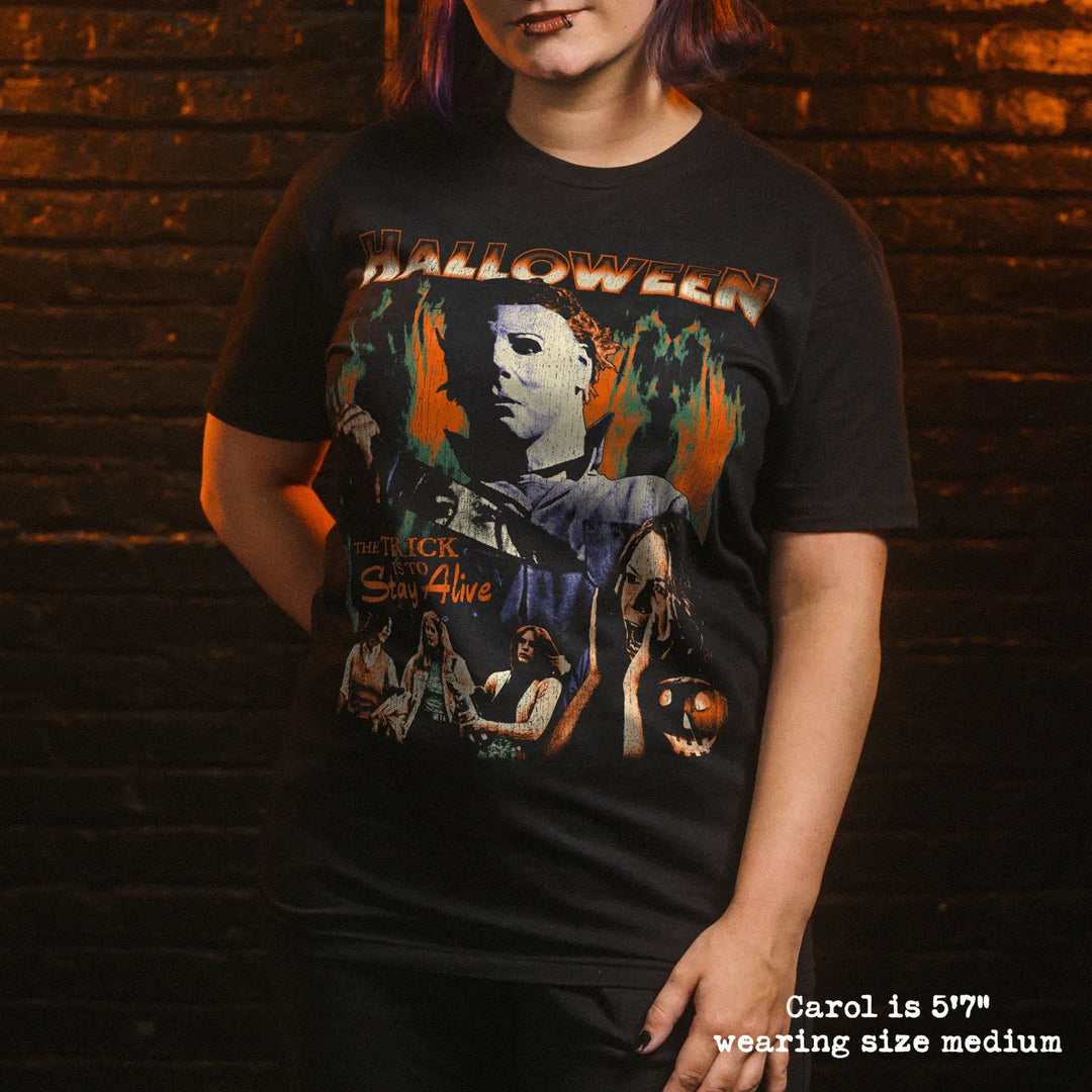 model wearing black premium tee with halloween graphic 