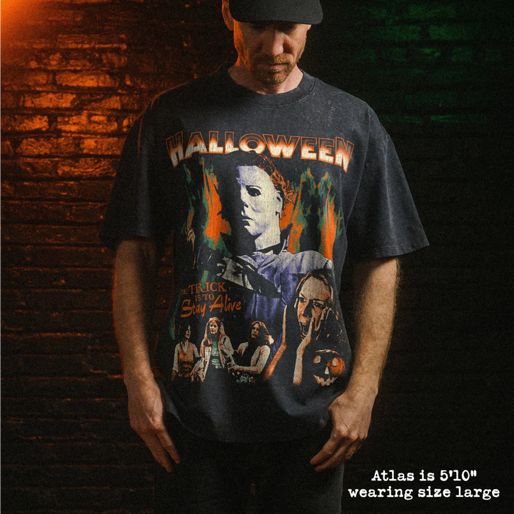 Male model wearing stone wash heavy tee with halloween graphic 