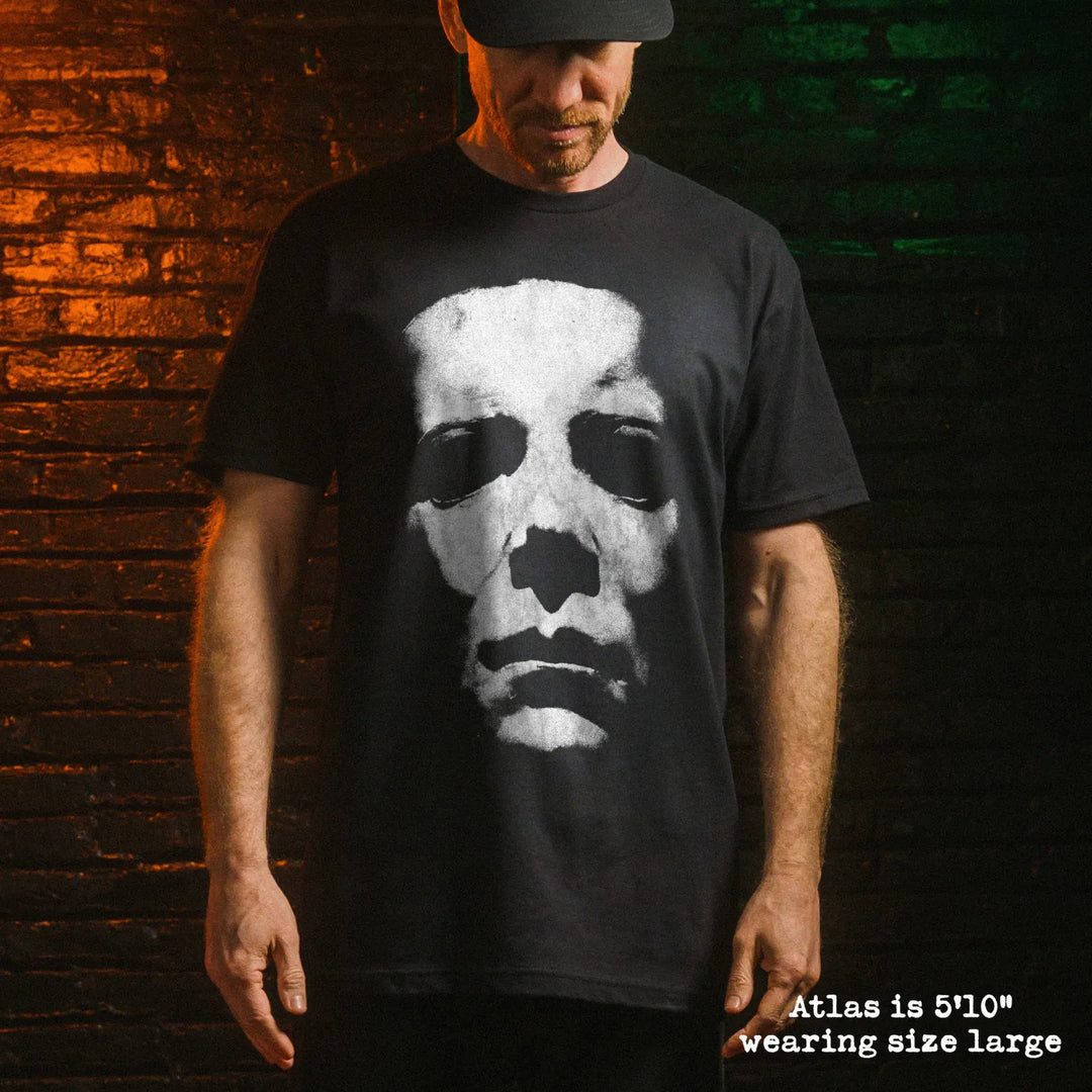 Male model wear soft premium tee with michael myers mask graphic
