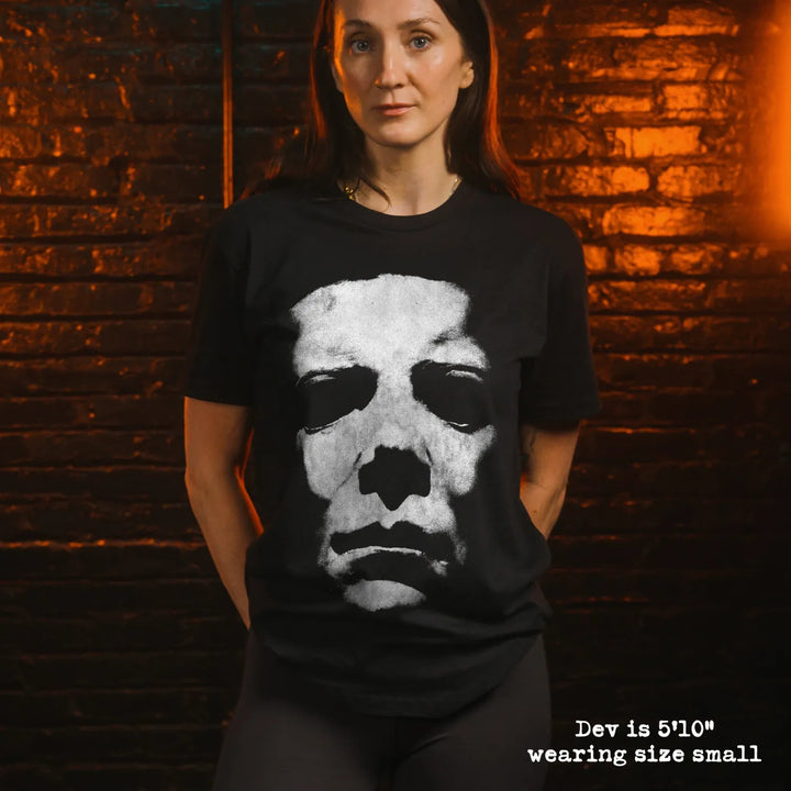 Model wear soft premium tee with michael myers mask graphic
