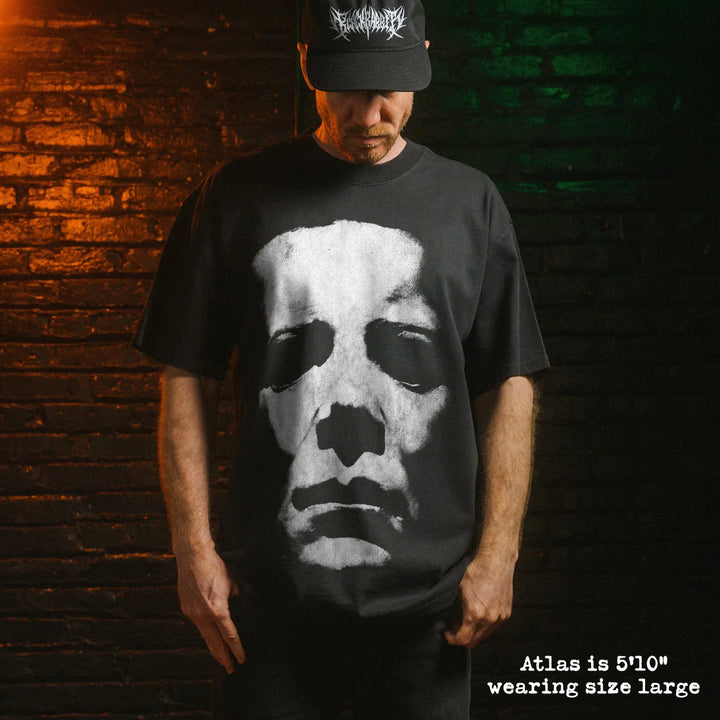 Model wearing heavy tee with michael myers mask graphic 