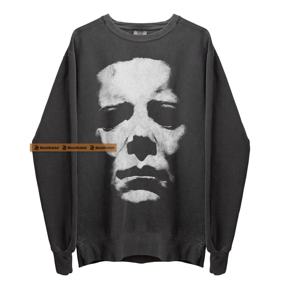 Gray sweatshirt with a white face.