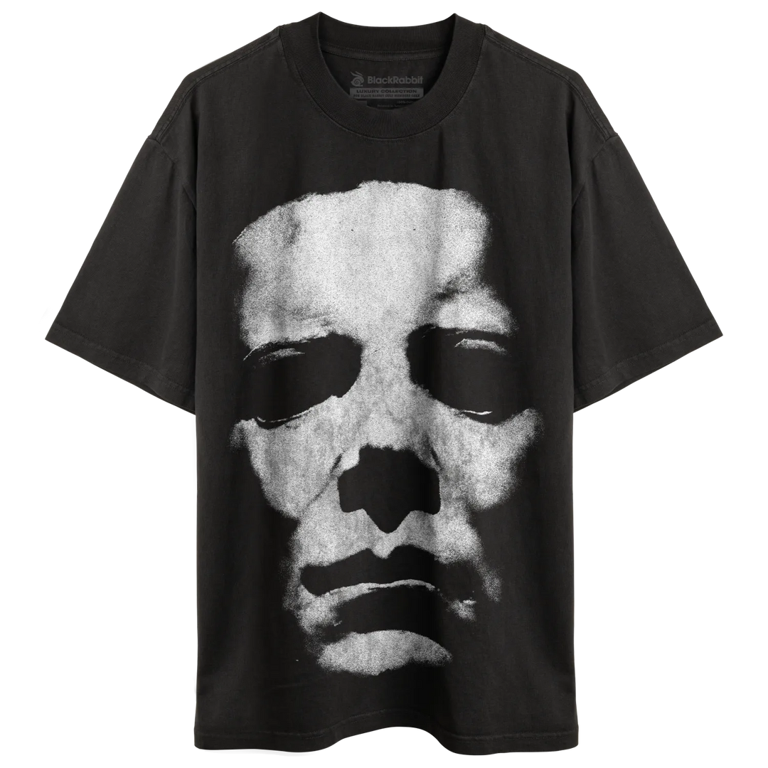 Black t-shirt with a distressed white skull graphic.