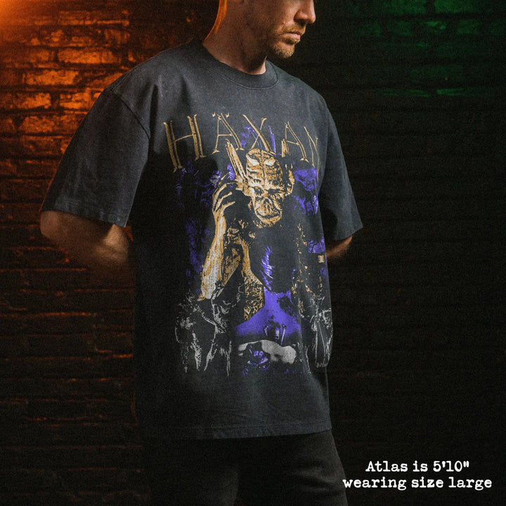 Male model wearing stone wash heavy tee with haxan graphic 