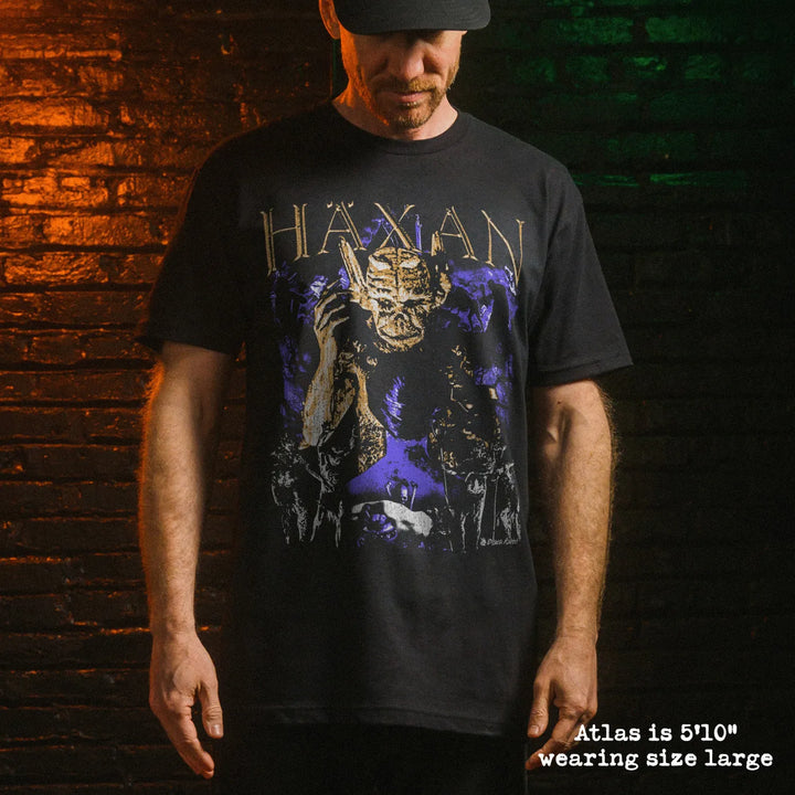 Male model wear soft premium tee with haxan graphic
