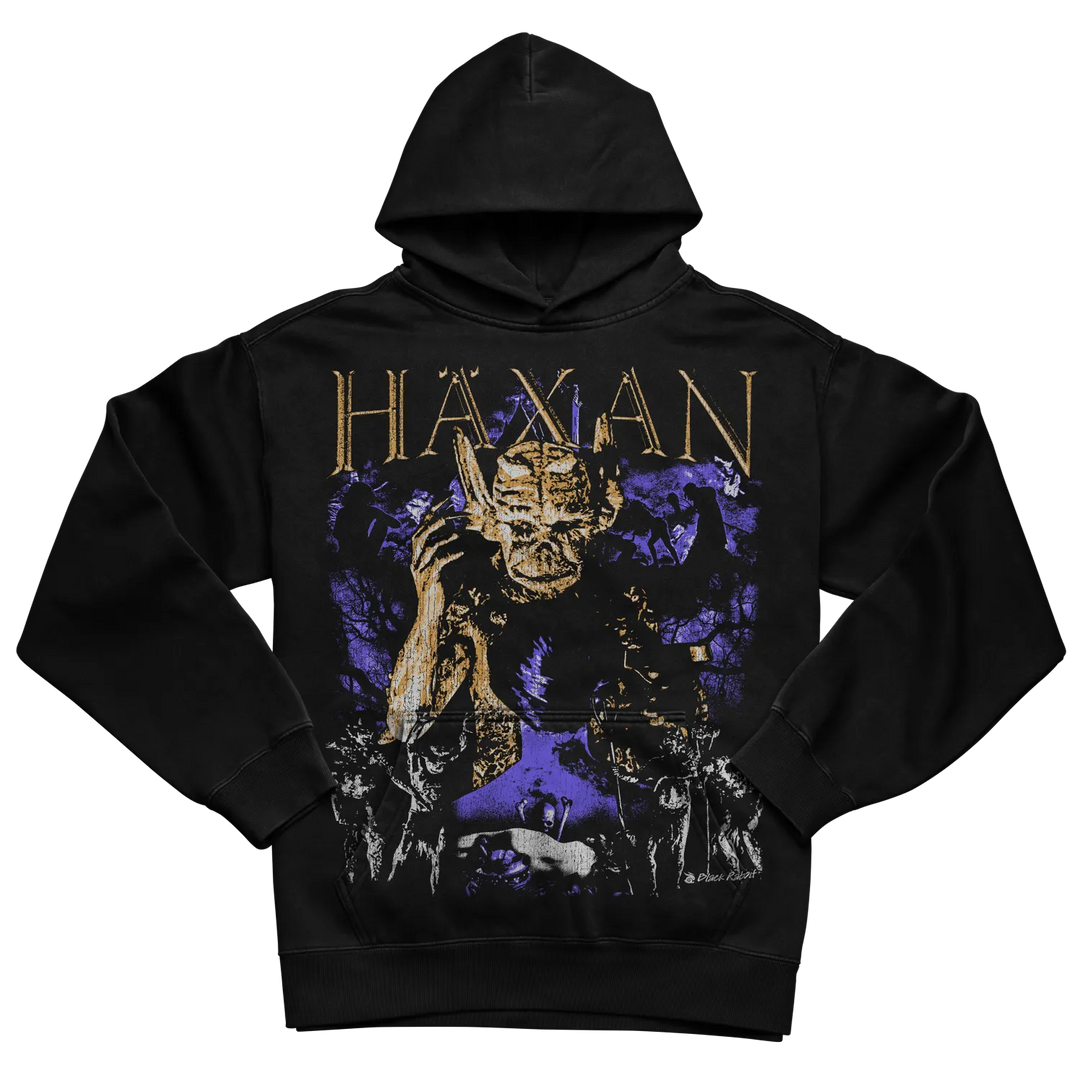 Black hoodie with gold and purple design featuring a character illustration.