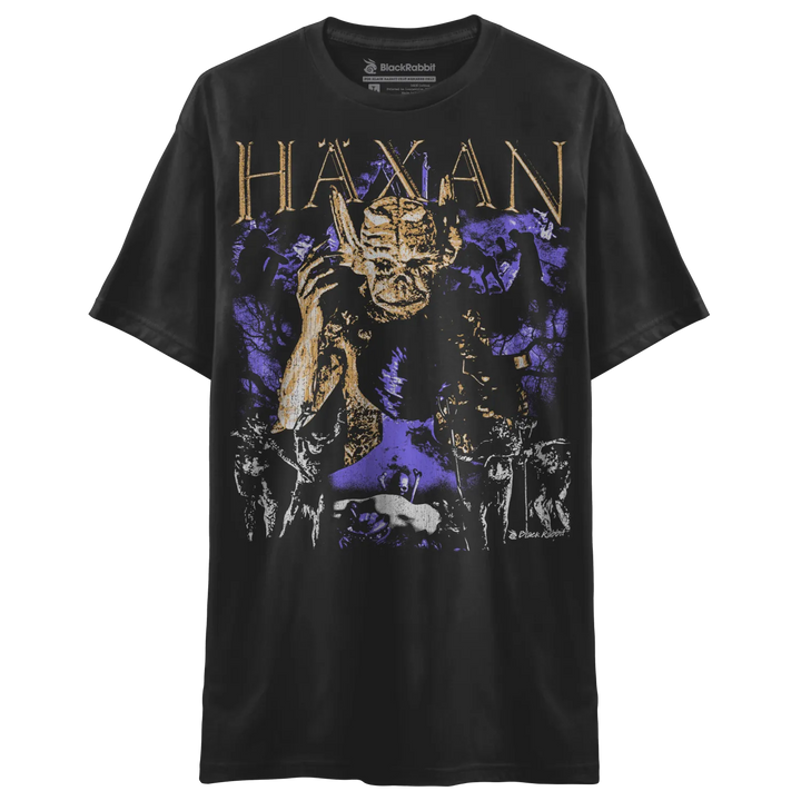 Black short-sleeved t-shirt with a purple and gold graphic print of a demonic figure.