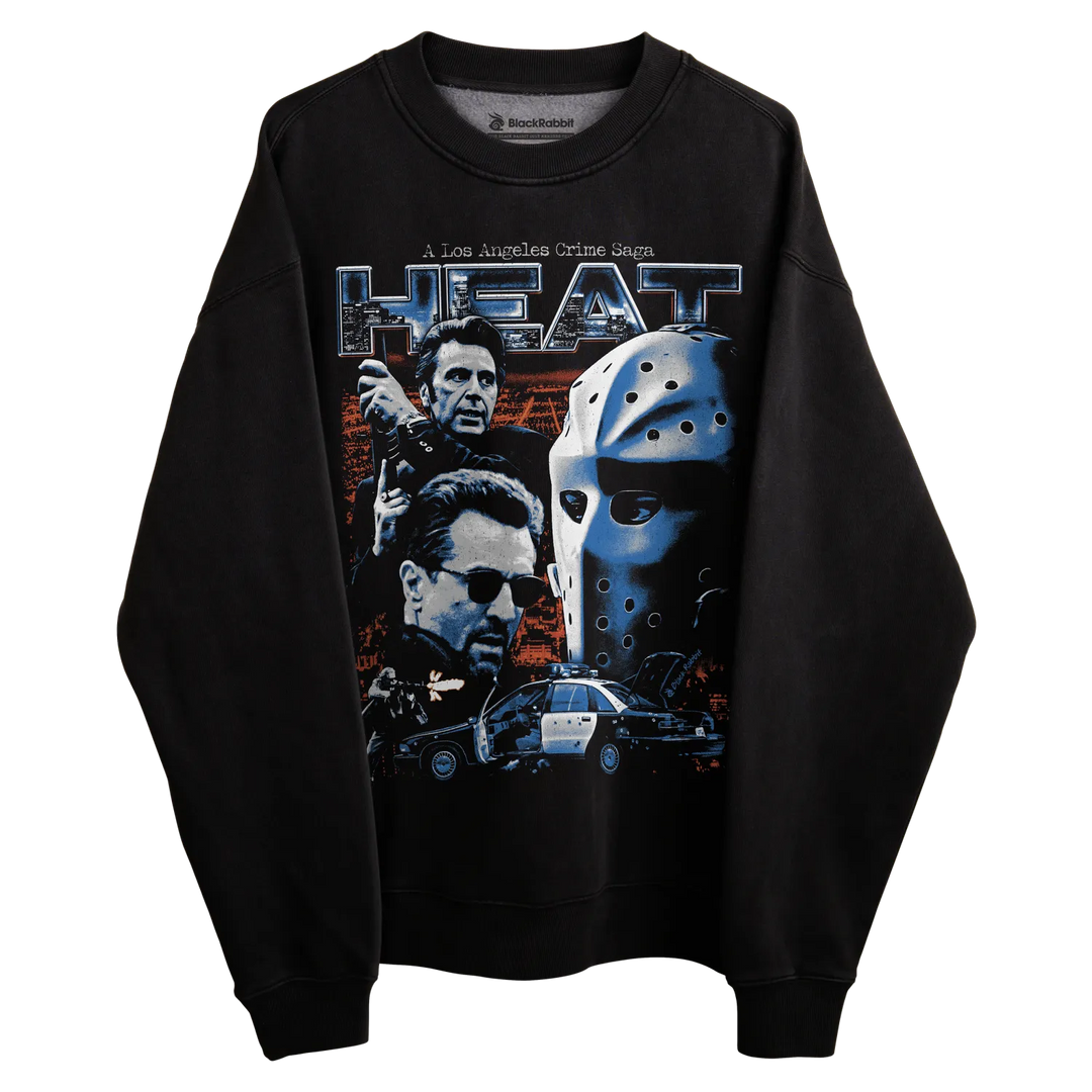 Black sweatshirt with ’heat’ graphic and movie poster design featuring characters from ’heat,’ ’friday the 13th,’ and other films.
