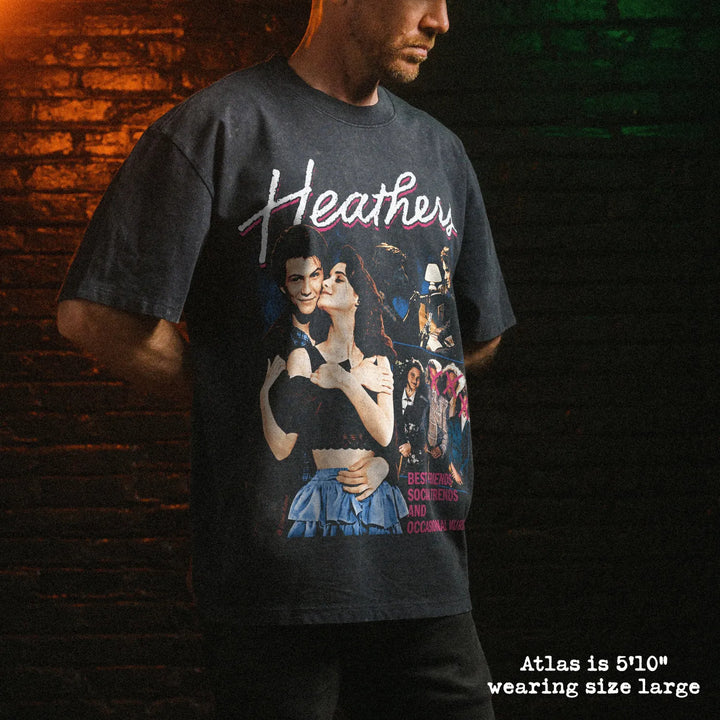 Male model wearing stone wash heavy tee with heathers graphic 