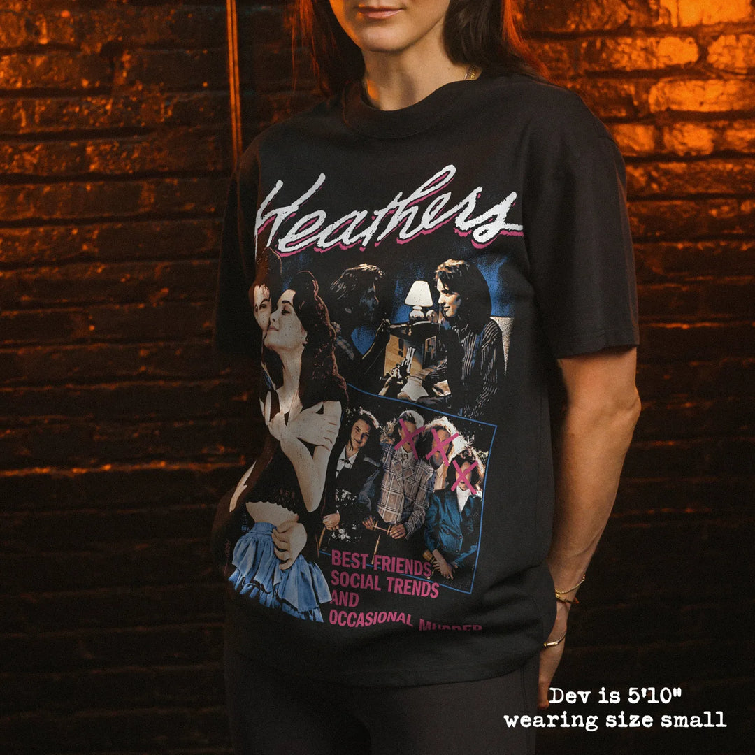 Model wearing heavy tee with heathers graphic 