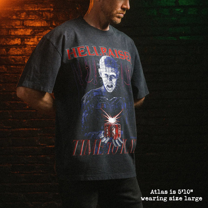 Male model wearing stone wash heavy tee with hellraiser graphic 