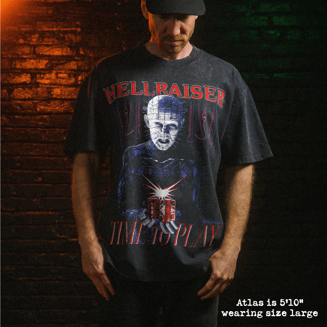 Male model wearing stone wash heavy tee with hellraiser graphic 