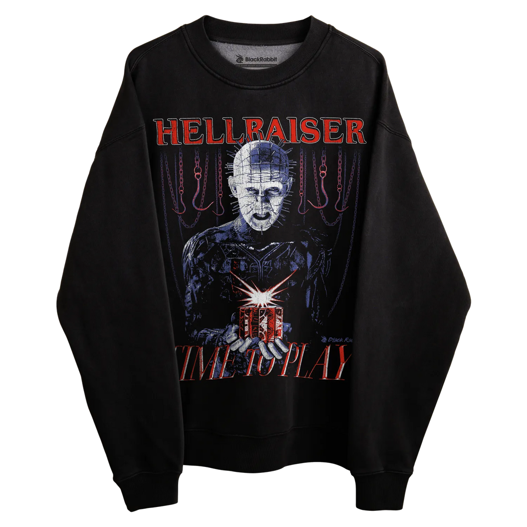Black long-sleeved sweatshirt with hellraiser design featuring a pinhead character and text.