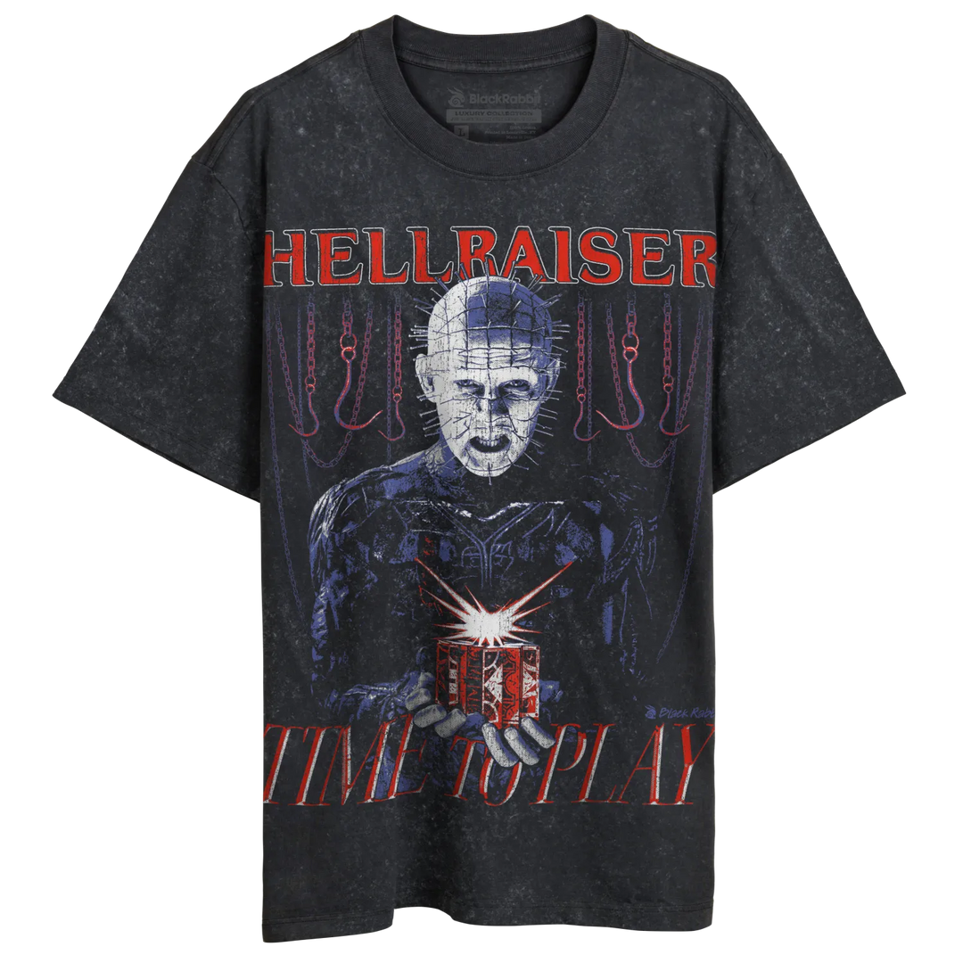 Black t-shirt with a ’Hellraiser’ design featuring Pinhead holding a puzzle box.