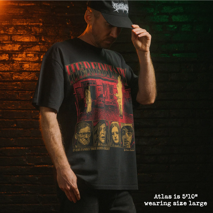 Model wearing heavy tee with hereditary graphic 