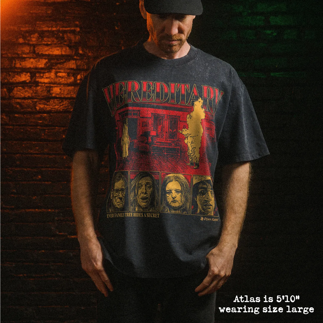 Male model wearing stone wash heavy tee with hereditary graphic 