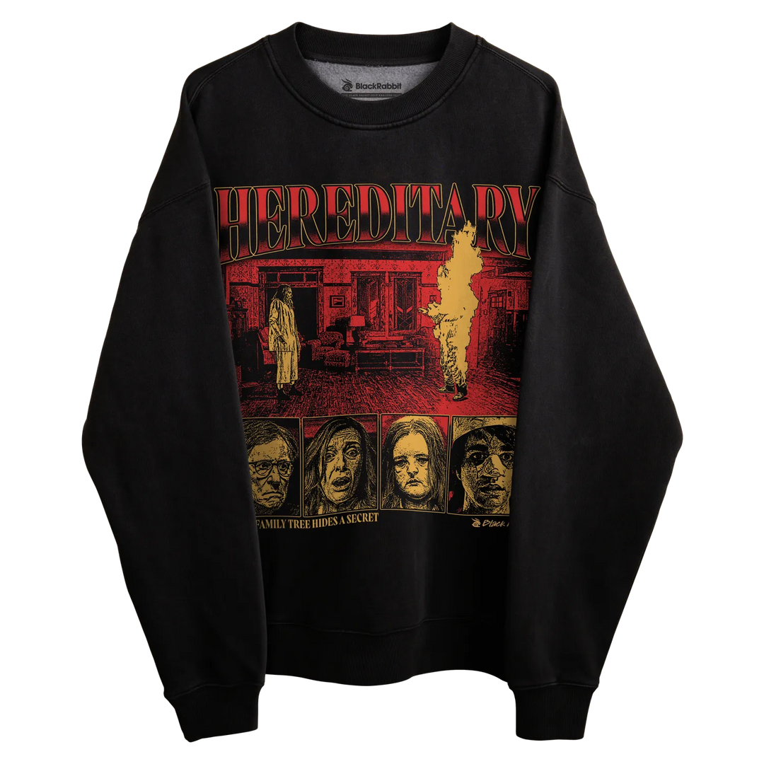 Black crewneck sweatshirt with ’hereditary’ graphic design featuring multiple faces and scenes from the movie.