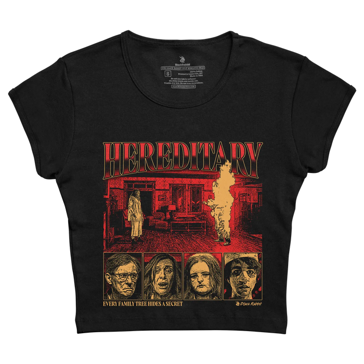 Black short-sleeved t-shirt featuring a red and yellow graphic of the movie ’hereditary’ with its characters, printed in a stylized horror art style.