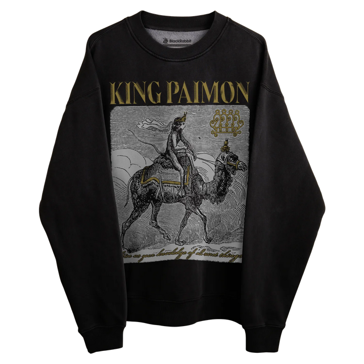Black sweatshirt with ’king paimon’ graphic and text design.