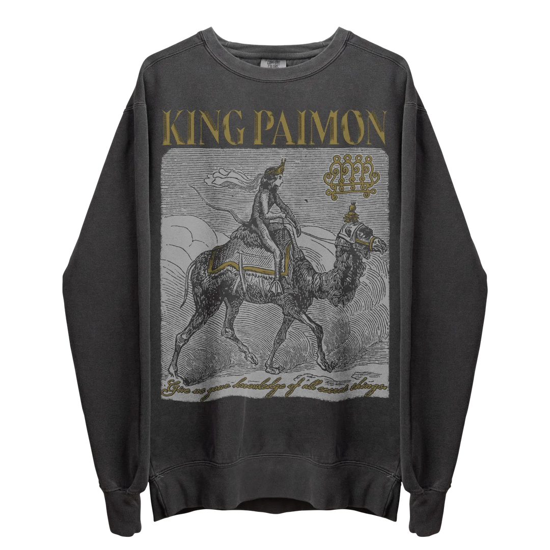 Dark grey crewneck sweatshirt with a detailed graphic of a figure riding a camel.