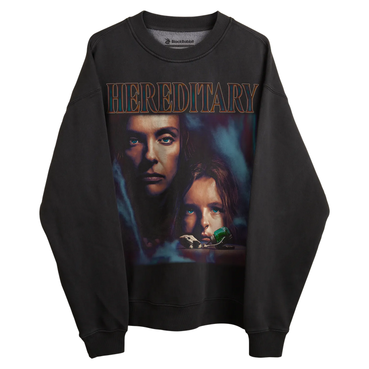 Black long-sleeved sweatshirt with ’hereditary’ graphic design featuring the movie poster.