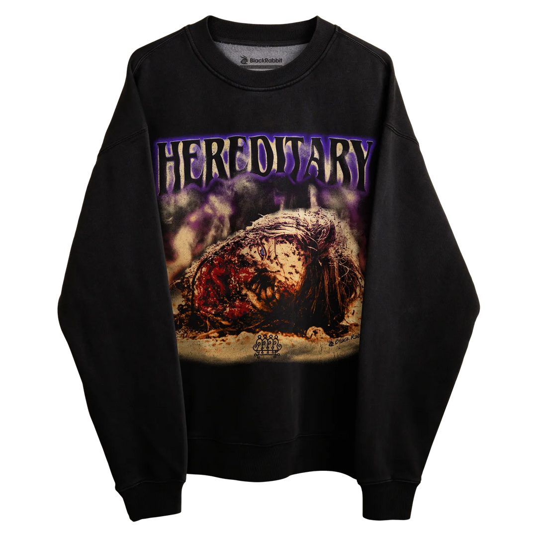 Black crewneck sweatshirt with ’hereditary’ graphic design featuring a horror movie poster print.