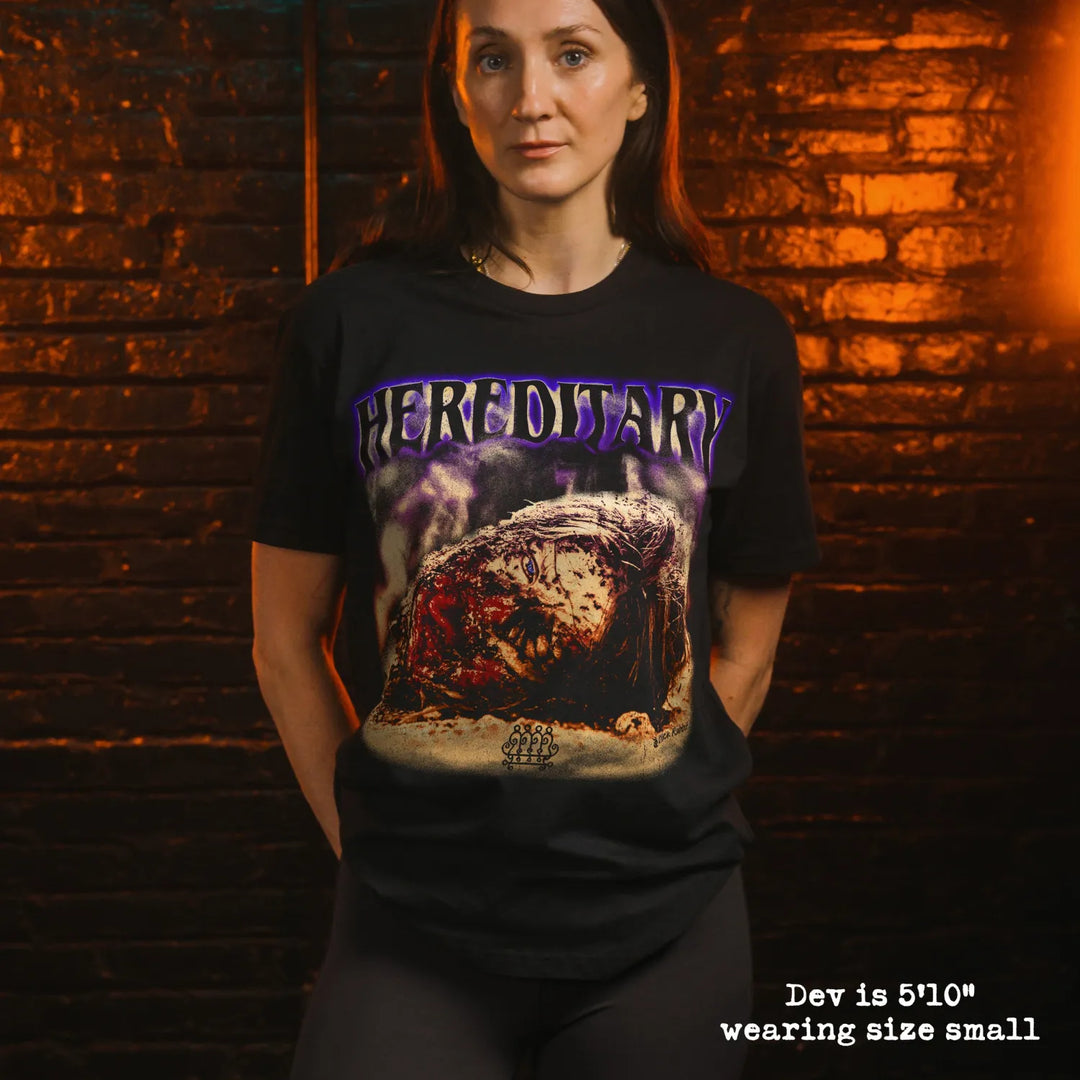 model wear soft premium tee with hereditary head graphic
