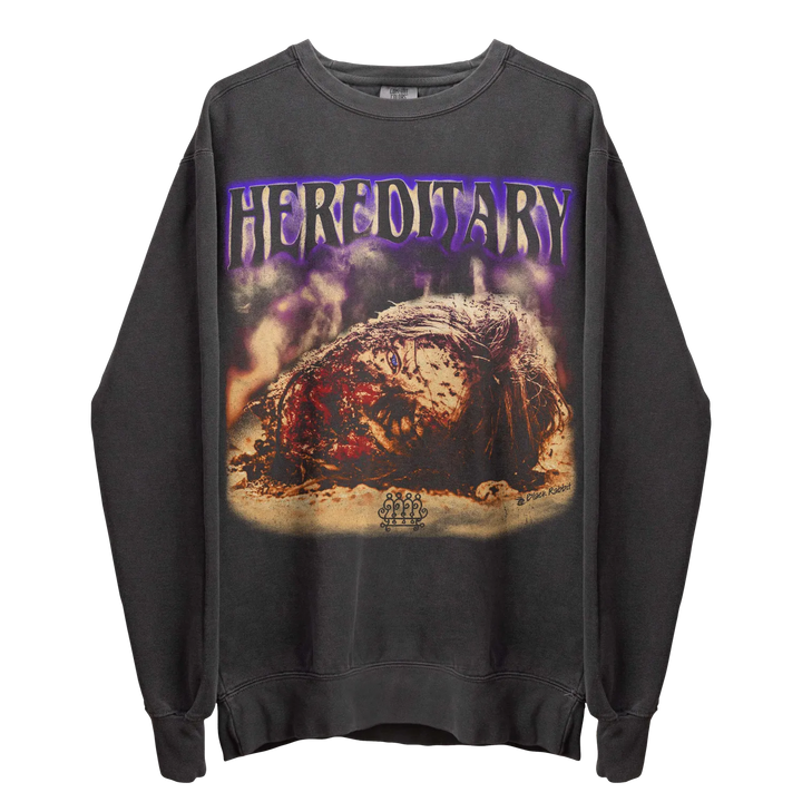 Distressed black long-sleeved sweatshirt with a horror movie graphic.