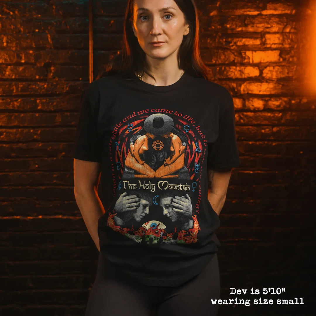 model wear soft premium tee with holy mountain graphic
