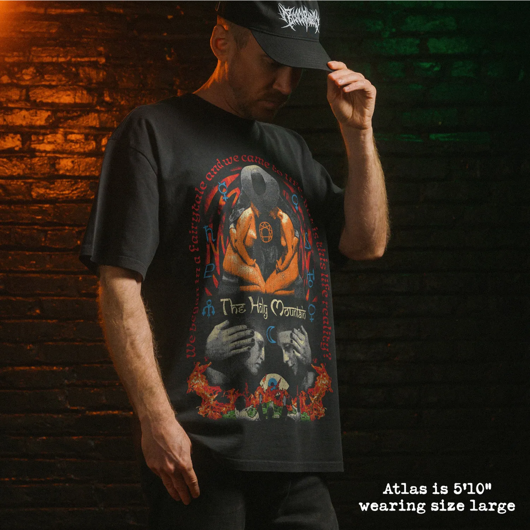 Model wearing heavy tee with holy mountain graphic 
