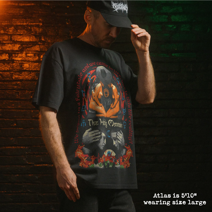 Model wearing heavy tee with holy mountain graphic 
