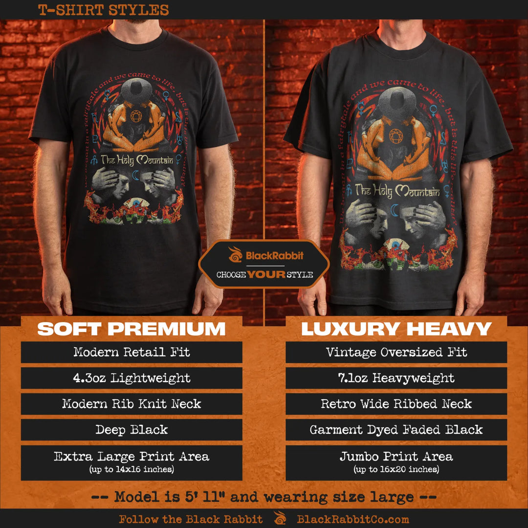 Black t-shirt with graphic design of a skull and wings, 4.3oz lightweight material, modern rib knit neck, deep black color, jumbo print area up to 20x16 inches, vintage oversized fit