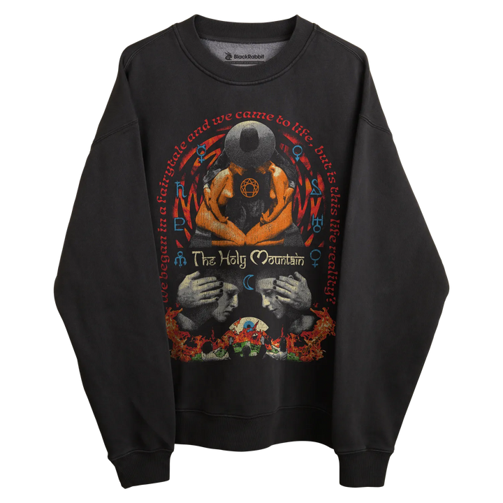 Black sweatshirt with graphic design featuring two faces and a skull, orange hands holding the skulls.