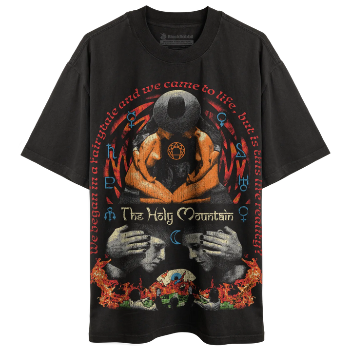 Black graphic tee with flame design and text ’the holy mountain’