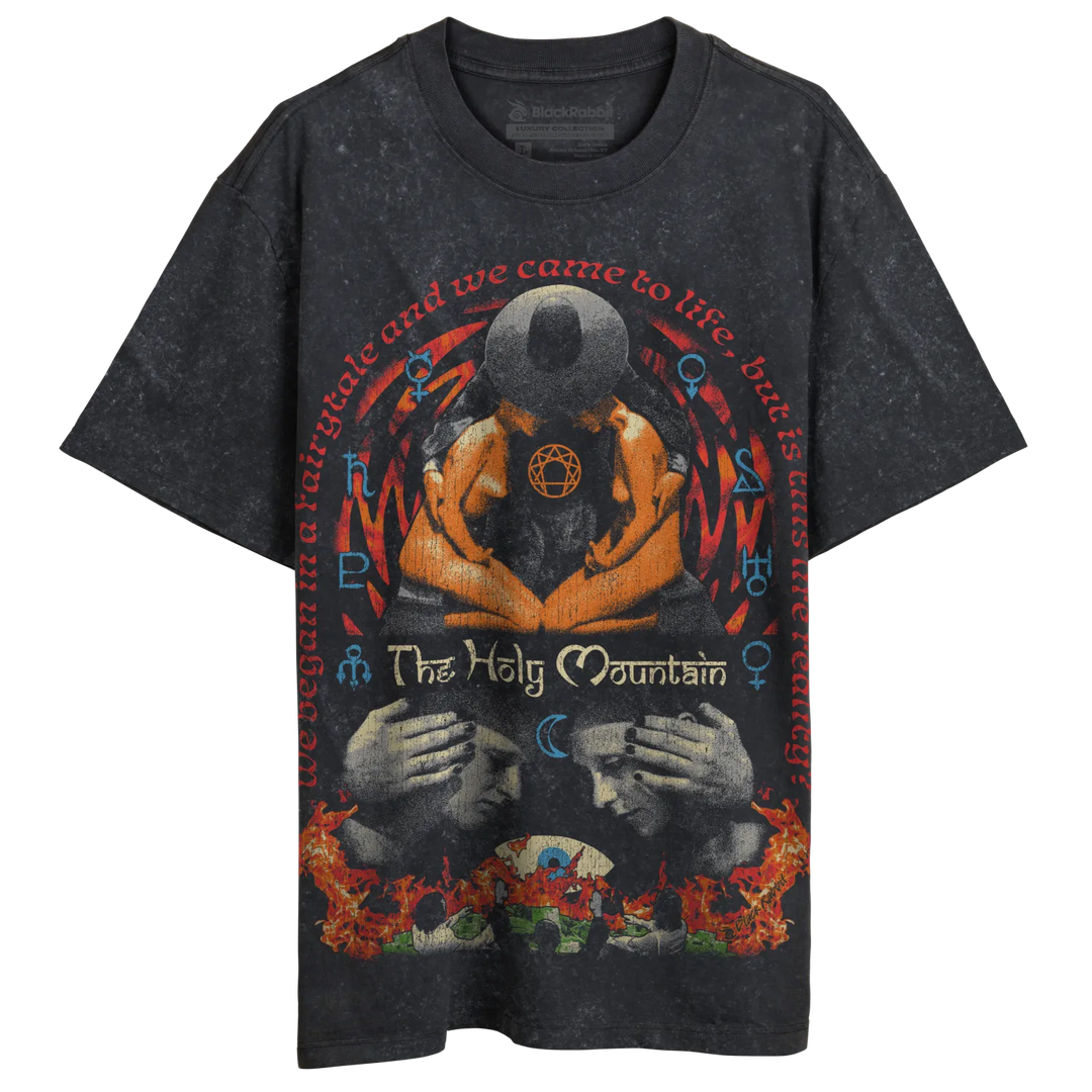 Black t-shirt with graphic design featuring a person and symbols, worn by mannequin.