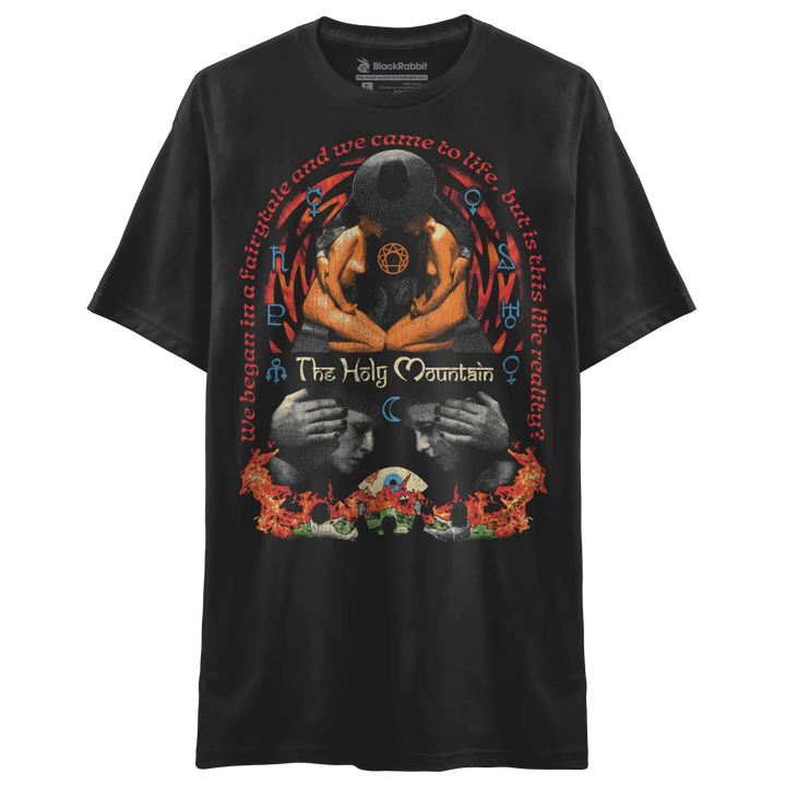 Black t-shirt with graphic design of two hands holding a skull, flames and text ’the holy mountain’