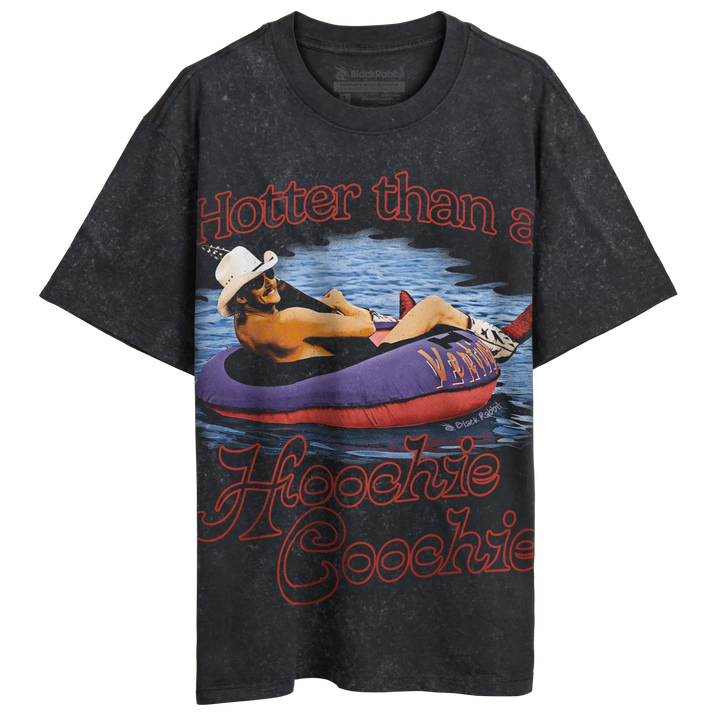 A black, short-sleeved t-shirt with a graphic print of a man in a tube on water and text.
