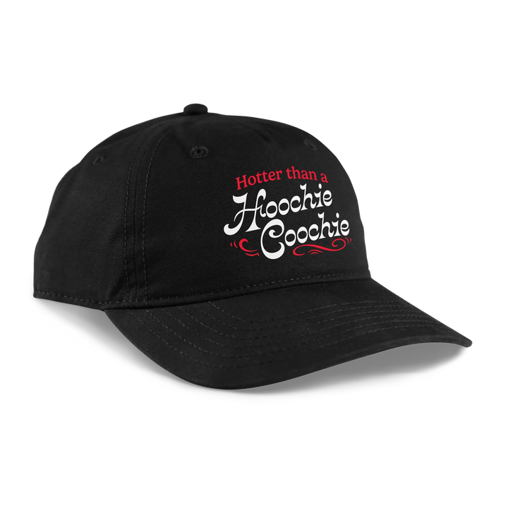 Black baseball cap with ’hotter than a hoochie coochie’ embroidered in red and white script.