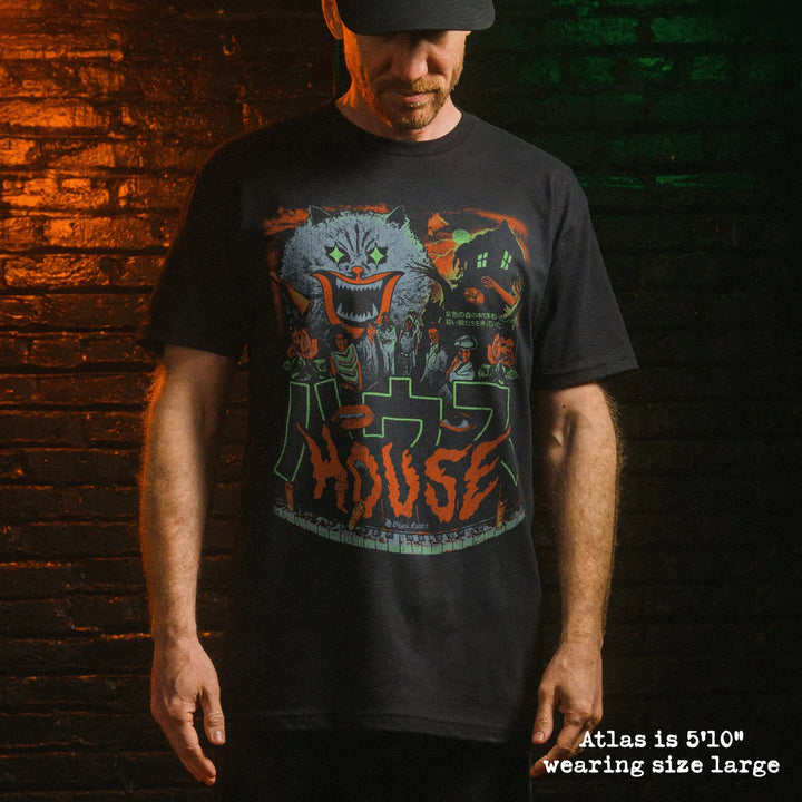 Male model wear soft premium tee with hausu graphic
