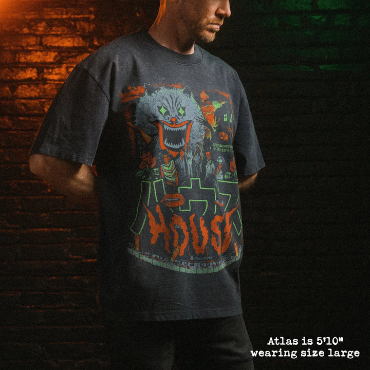 Male model wearing stone wash heavy tee with hausu graphic 