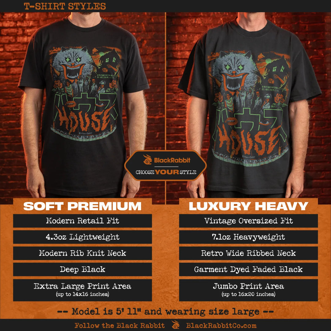 Two black t-shirts in different styles, featuring a graphic print of a monster and a house.