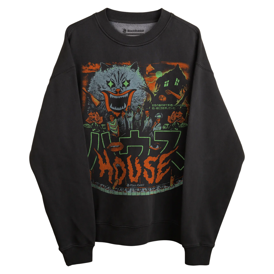 Black crewneck sweatshirt with ’house’ graphic design featuring a horror movie poster style, including an evil clown character and japanese text.