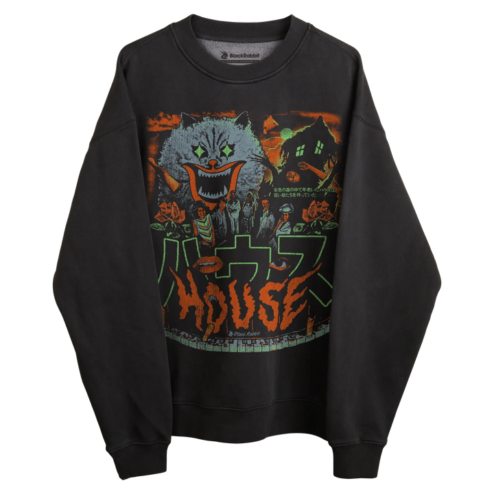 Black crewneck sweatshirt with ’house’ graphic design featuring a horror movie poster style, including an evil clown character and japanese text.