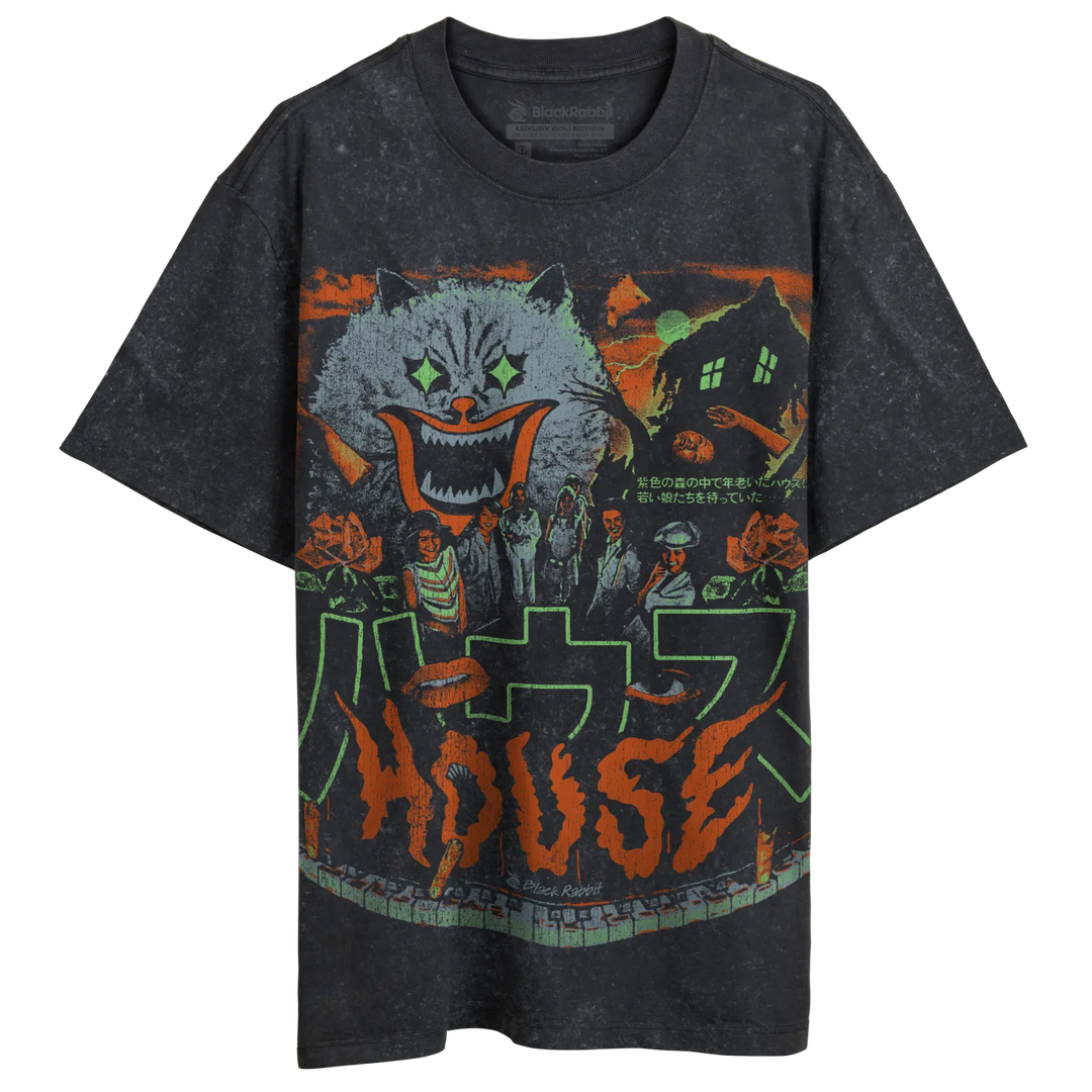 Washed black t-shirt with a vibrant, horror-themed graphic featuring a large cat face, a haunted house, and figures, with ’HOUSE’ in distressed orange text and Japanese characters.