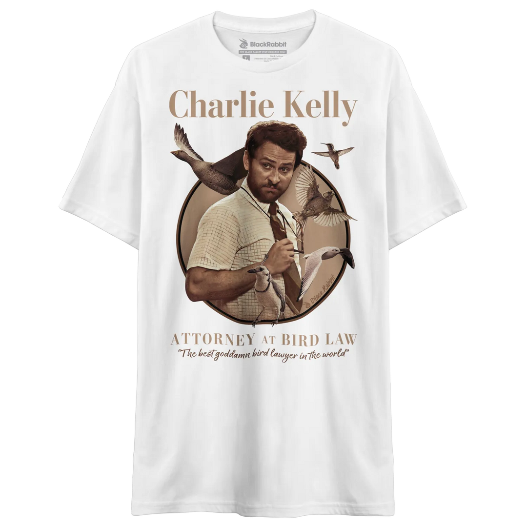 White t-shirt with charlie kelly graphic and text design. 