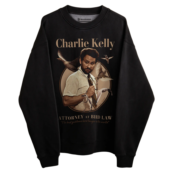 Black crewneck sweatshirt with charlie kelly graphic and text design. 