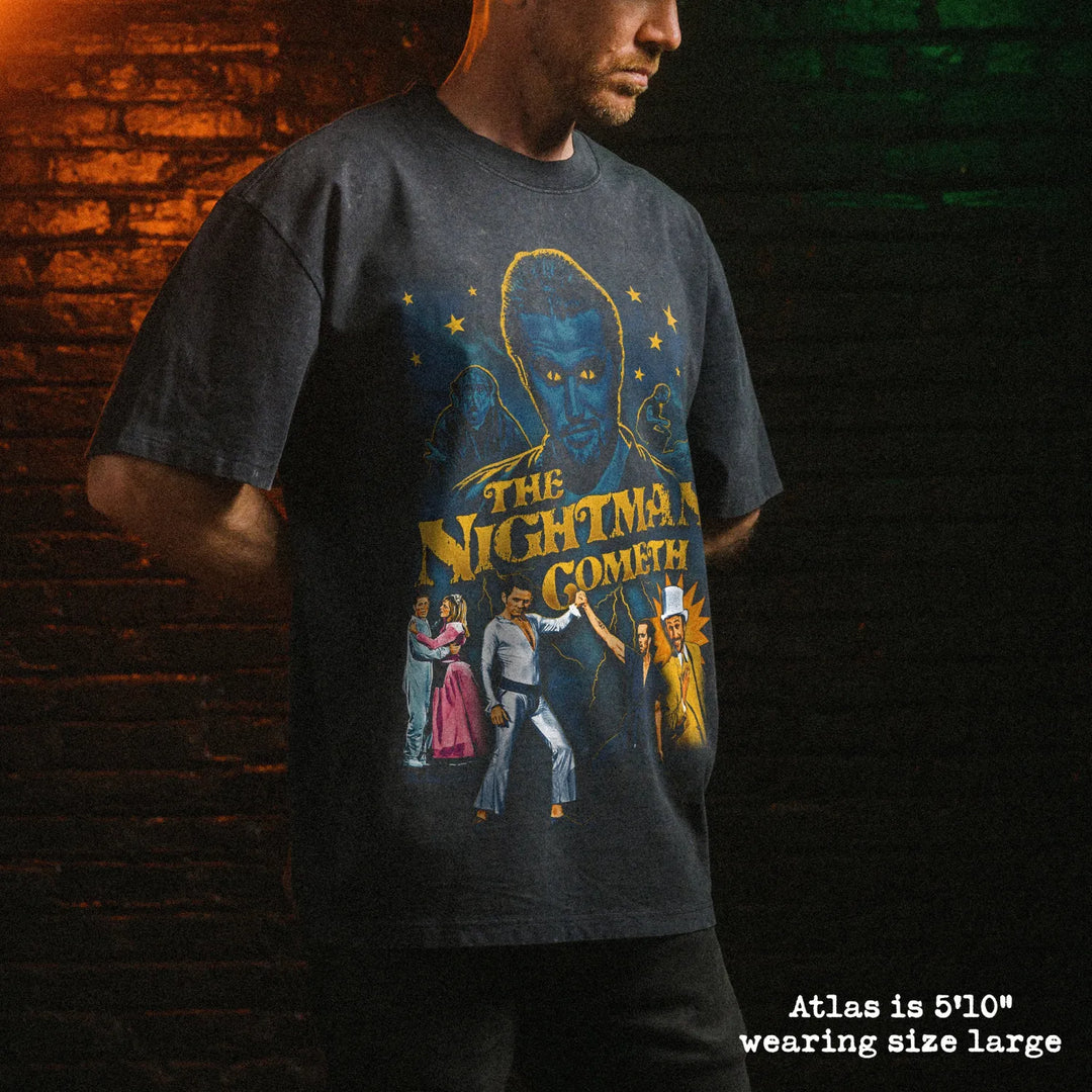 Male model wearing stone wash heavy tee with nightman graphic 